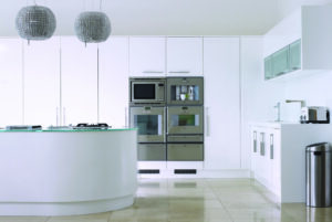 High gloss open plan kitchen with curved island
