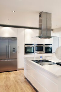 modern high gloss kitchen island with neff appliances