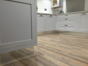Oak Floor with mirrored plinths and painted kitchen Sheffield