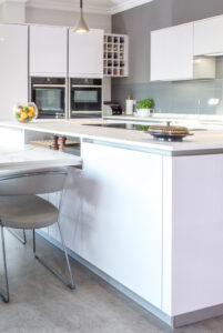 Handle-less kitchen with dekton worktops inspired by German efficiency