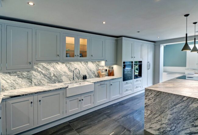 Large kitchen island with built in appliances